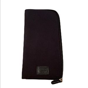 Coach passport holder with tags